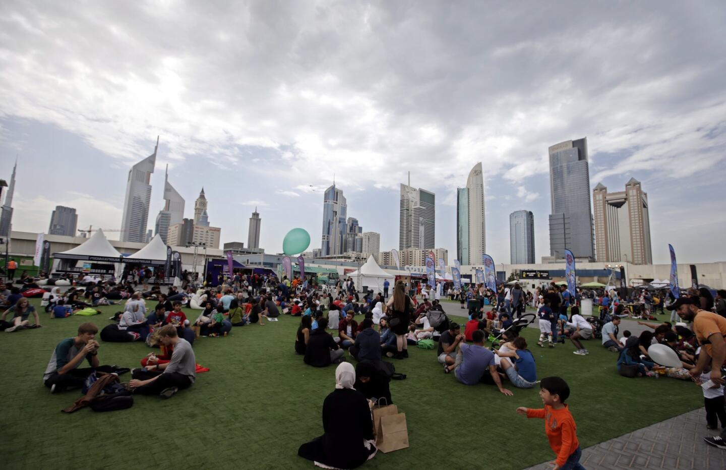 Visitors gather during Middle East Film & Comic Con (MEFCC) in Dubai, United Arab Emirates.
