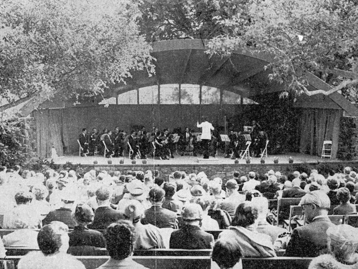 Aaron Copland leads an orchestra at Libbey Bowl during the 1957 Ojai Music Festival.