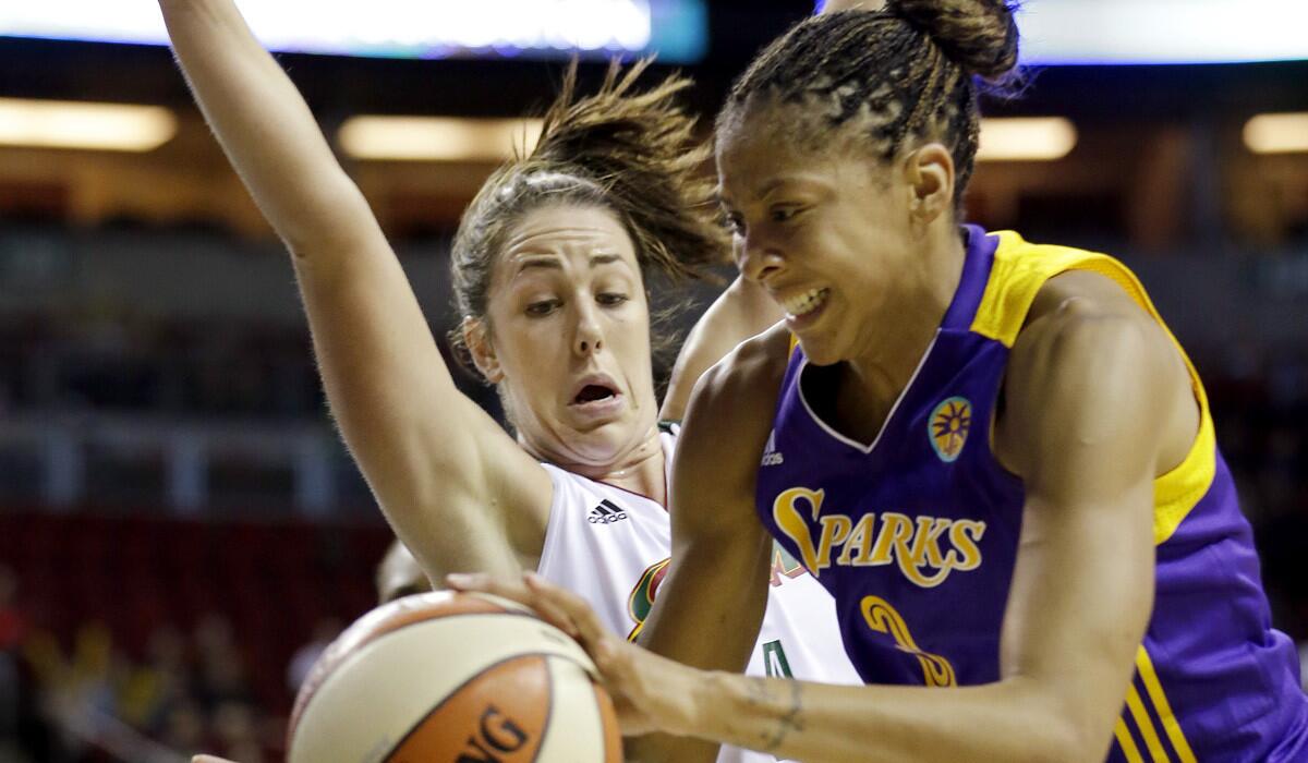 Sparks forward Candace Parker, driving against Storm guard Jenna O'Hea earlier this season, is averaging 21.3 points, 8.0 rebounds and 4.3 assists a game this season.