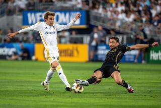 PASADENA, CA - JULY 4: Riqui Puig #10 of Los Angeles Galaxy battles Ilie Sánchez.