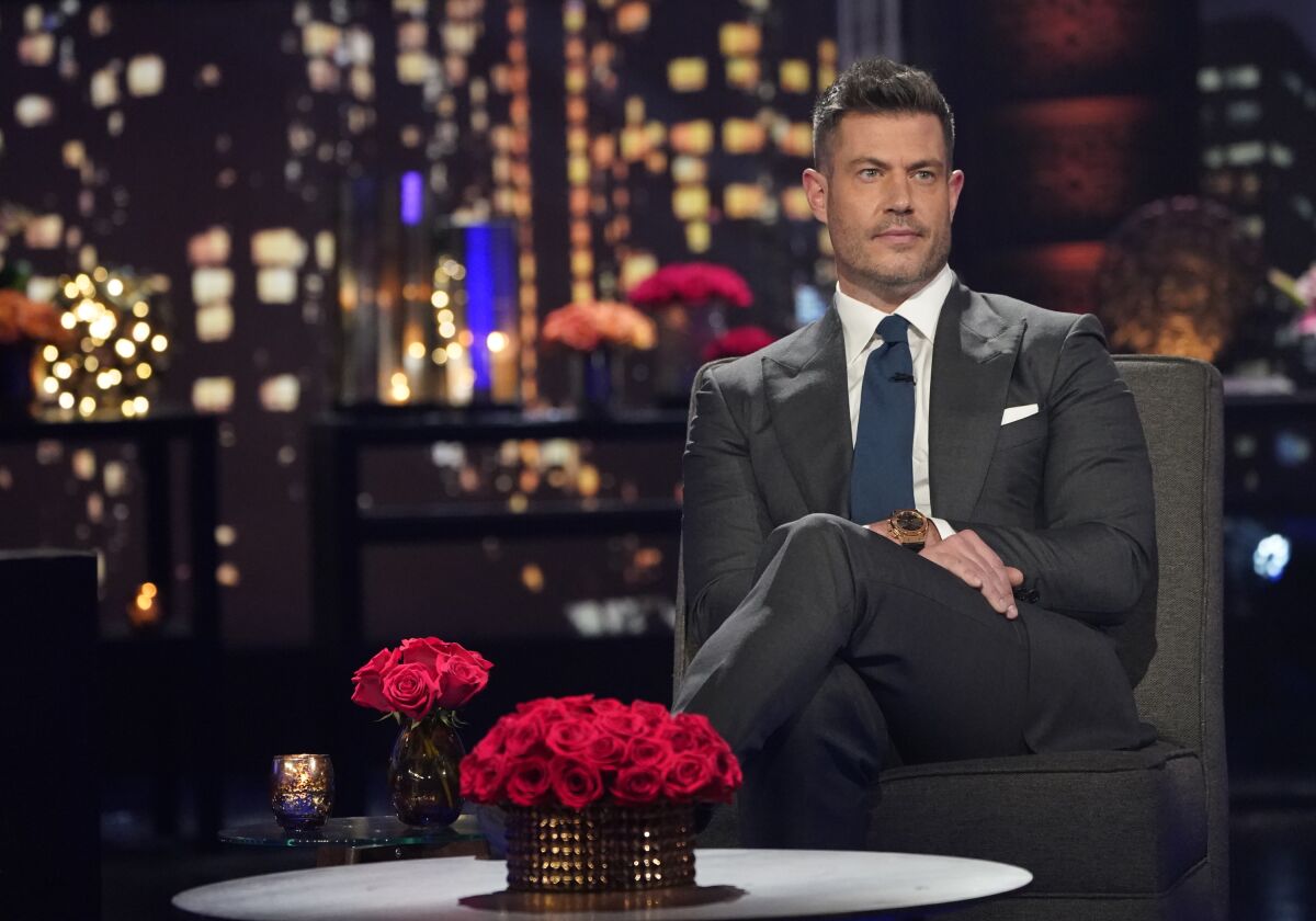 A man in a suit on a television set