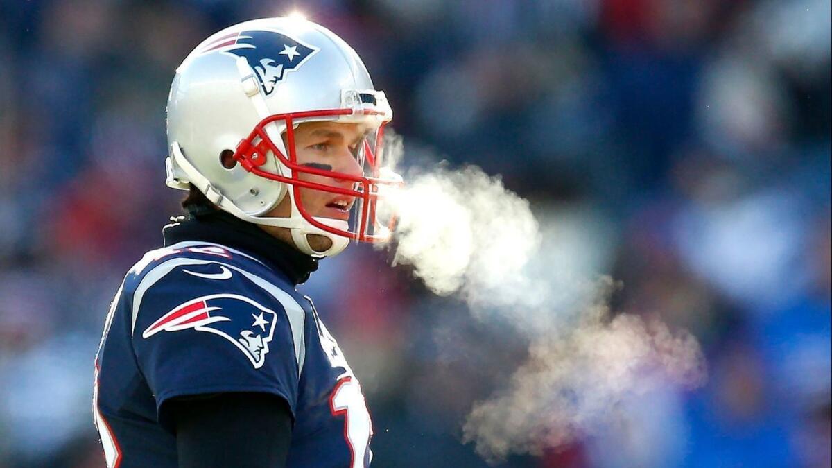 New England Patriots quarterback Tom Brady as they play the Chargers during the first half of their AFC divisional playoff game at Gillette Stadium on Jan. 13, 2019.