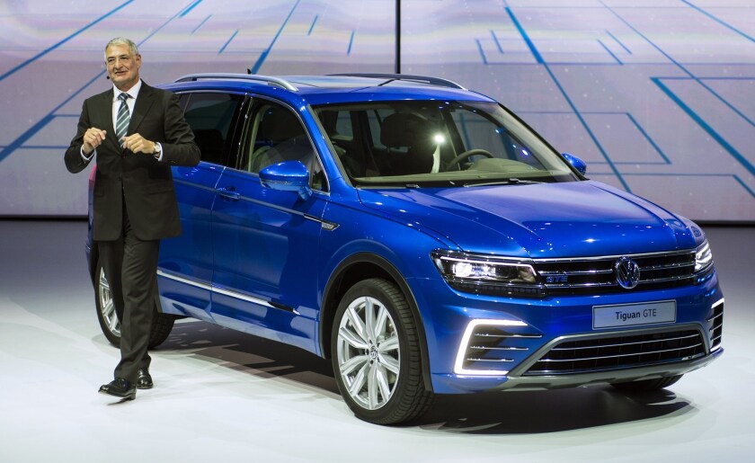Heinz-Jakob Neusser, a member of the Board of Management for the Volkswagen brand, presents a new VW model to an audience on Sept. 14 in Frankfurt.