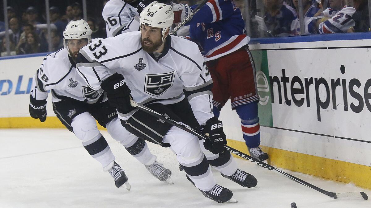 Kings defenseman Willie Mitchell controls the puck during Game 4 of the Stanley Cup Final against the New York Rangers on June 11. Mitchell's time with the Kings appears to be over.