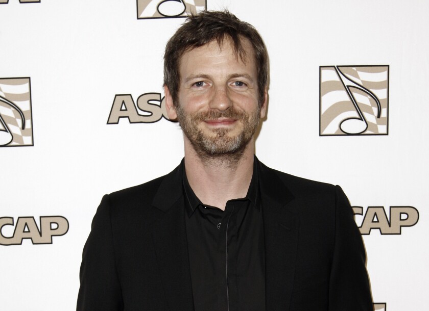 FILE - Songwriter Lukasz "Dr. Luke" Gottwald arrives at the 28th Annual ASCAP Pop Music Awards in Los Angeles, on April 27, 2011. The controversial music producer and hitmaker rose to the top of the Billboard charts with Doja Cat’s ubiquitous funk-pop jam “Say So,” along with Saweetie's anthemic bop “Tap In” and Juice WRLD's Top 5 pop smash “Wishing Well." Dr. Luke appeared as Tyson Trax on the Grammy ballot for Doja Cat's “Say So," which he produced and co-wrote. The hit tune is competing for record of the year, where Dr. Luke is contention as the song’s producer. (AP Photo/Matt Sayles, File)