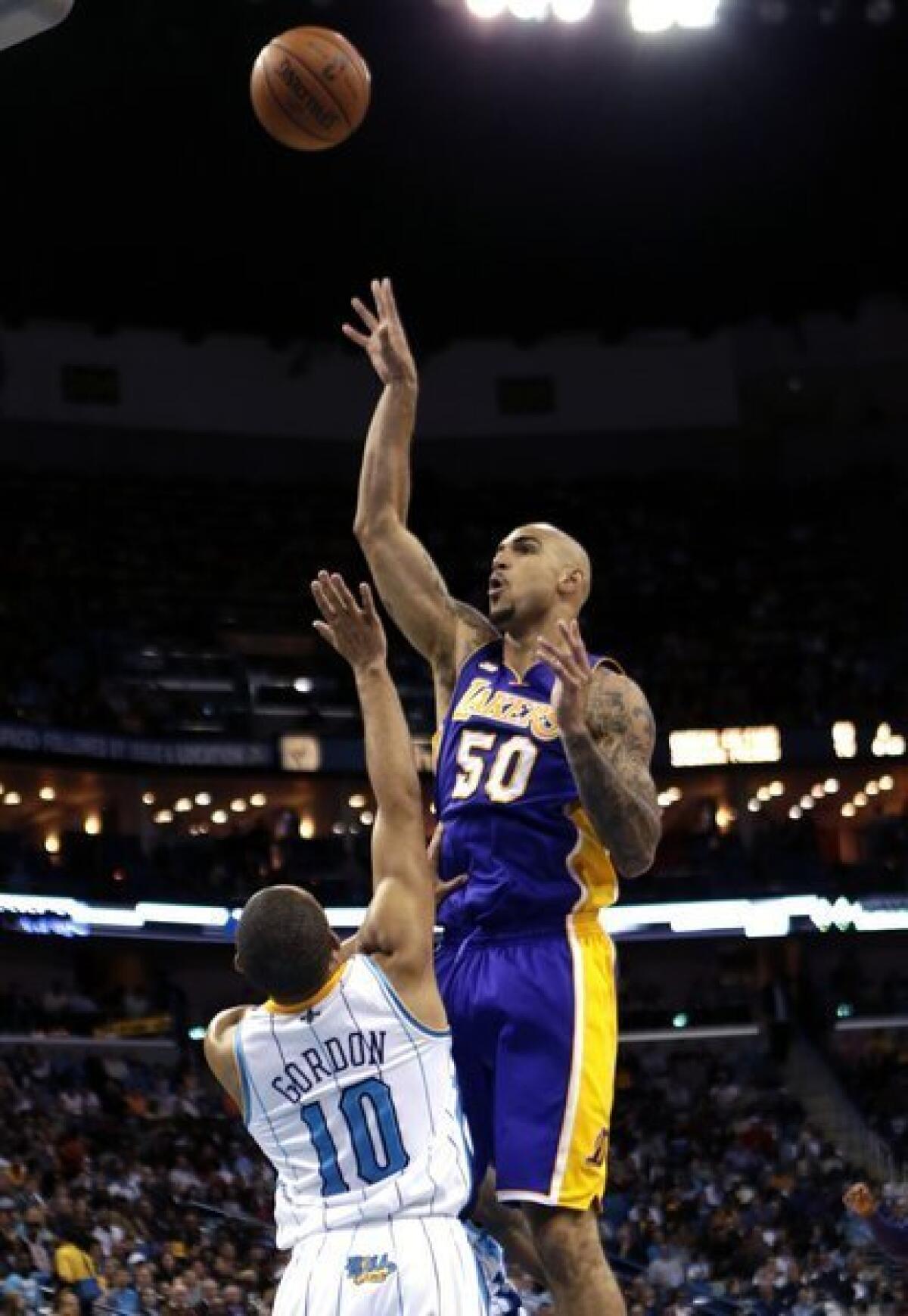 The Lakers recently re-signed 7-foot center Robert Sacre to a multiyear contract.