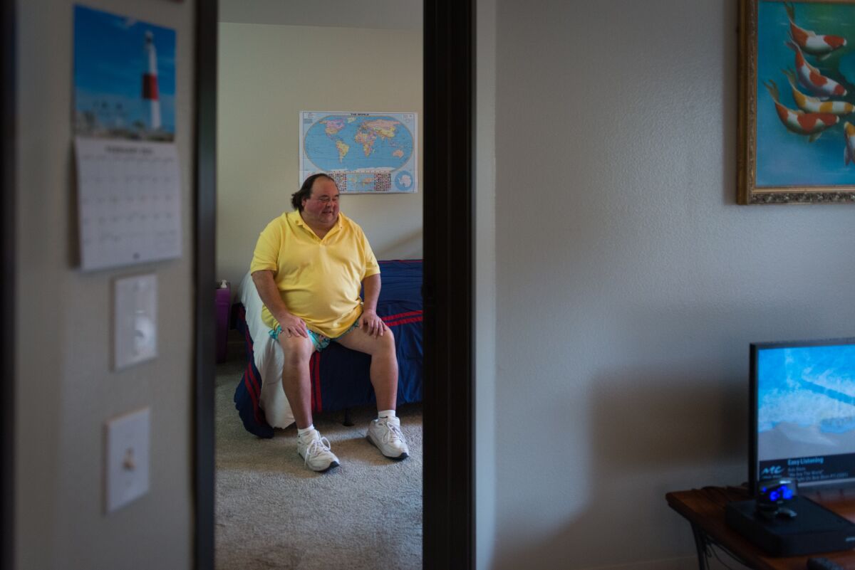 Stephen Morton sits in his tidy Laguna Woods apartment in Orange County.