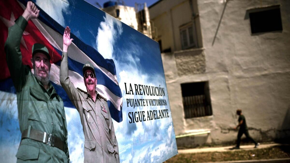 A poster of Fidel and Raul Castro still stands in Havana, Cuba, this week.