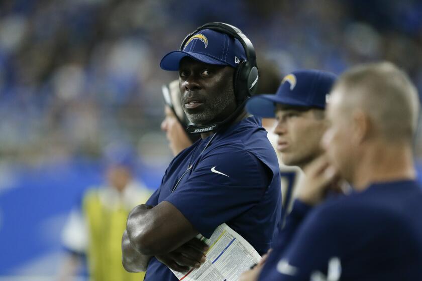 Los Angeles Chargers head coach Anthony Lynn watches in the first half of an NFL football game against the Detroit Lions in Detroit, Sunday, Sept. 15, 2019. (AP Photo/Duane Burleson)