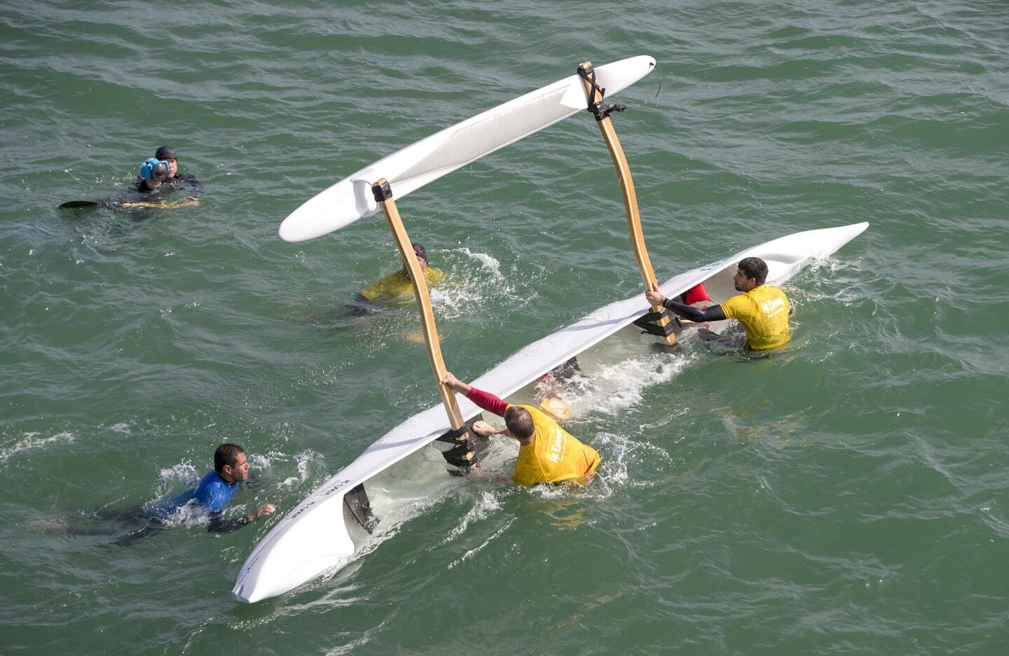 Outrigger surf canoe rides start at the Huntington Beach Pier