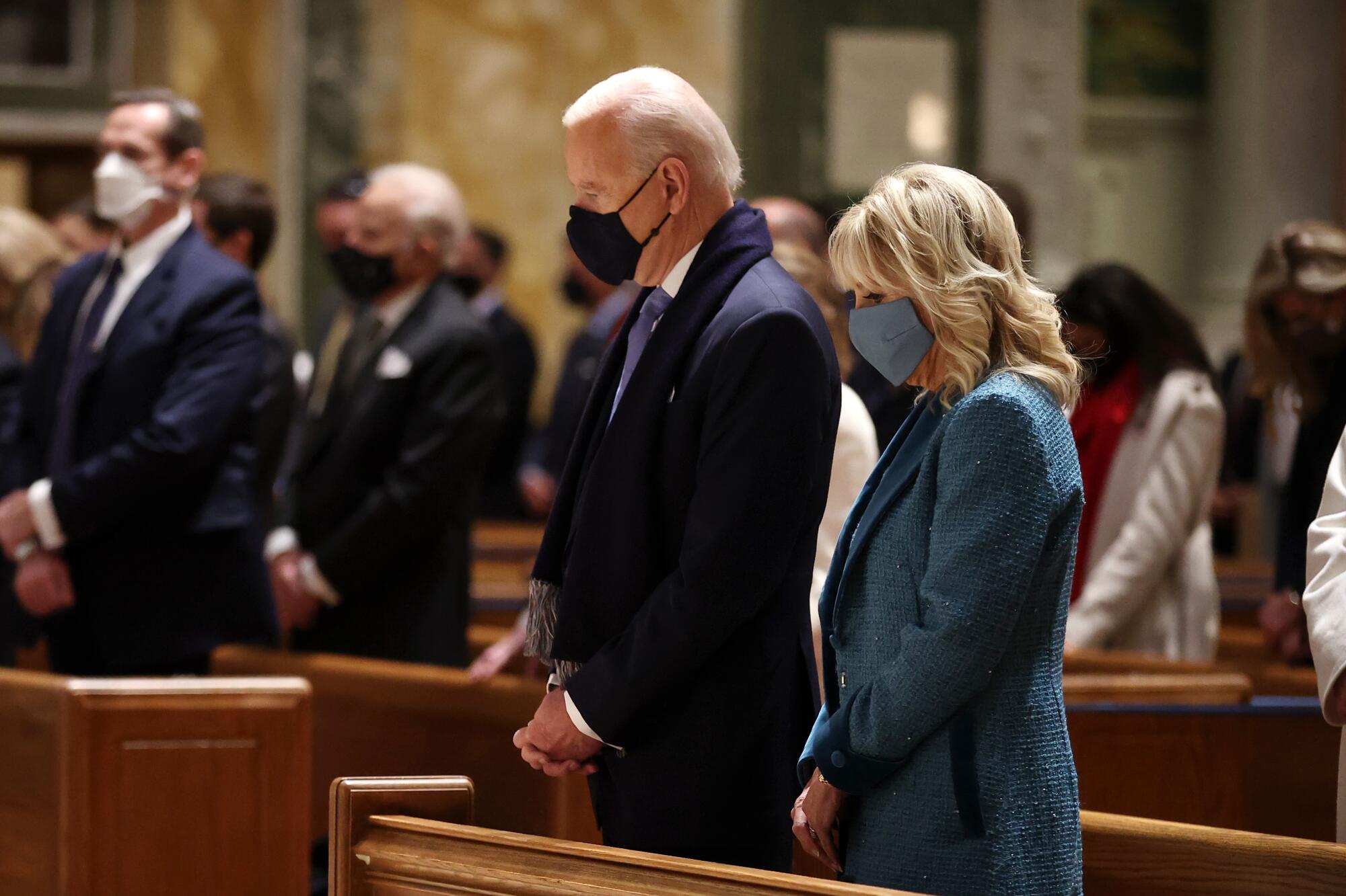 Joe Biden and wife Jill attend services at the Cathedral of St. Matthew the Apostle.