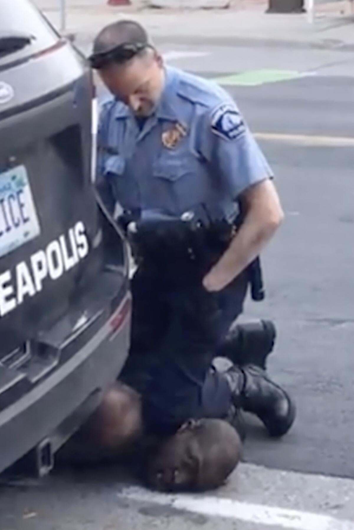 In this frame from a May 25 video provided by Darnella Frazier, a Minneapolis officer kneels on the neck of George Floyd, who was handcuffed and pleading that he could not breathe.