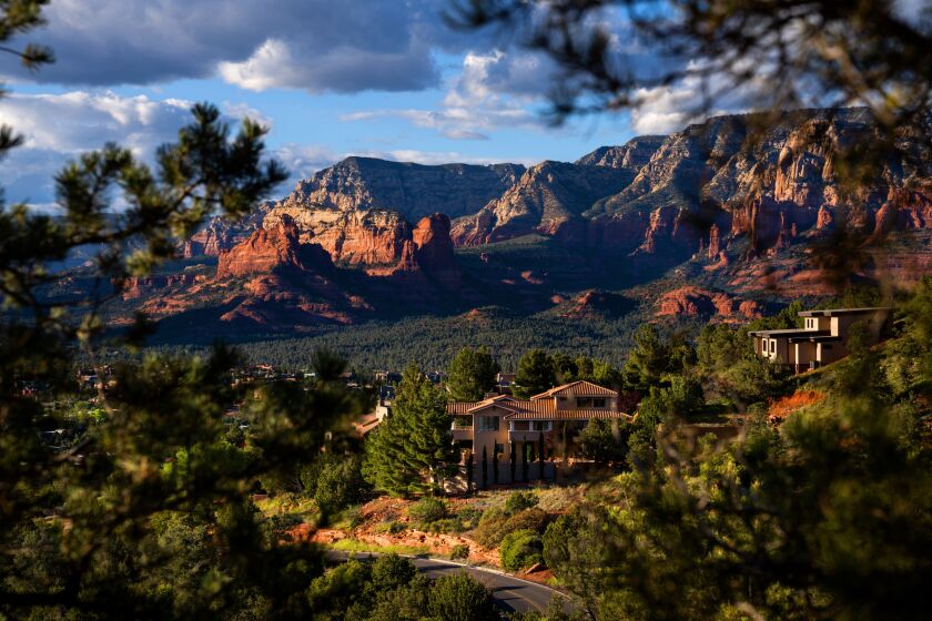 A popular tourist destination, Sedona, nestled in the northern Verde Valley region, is perhaps widely known for the red sandstone formations surrounding the city. Here, it acts as a backdrop to homes in the central Arizona city.