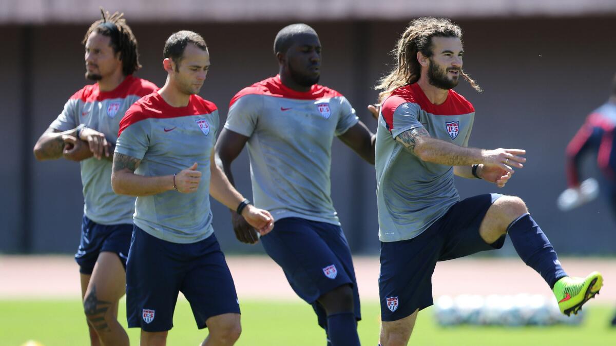 U.S. players (from left to right) Jermaine Jones, Brad Davis, Jozy Altidore and Kyle Beckerman take part in a training session Monday in preparation for Tuesday's World Cup elimination match against Belgium.