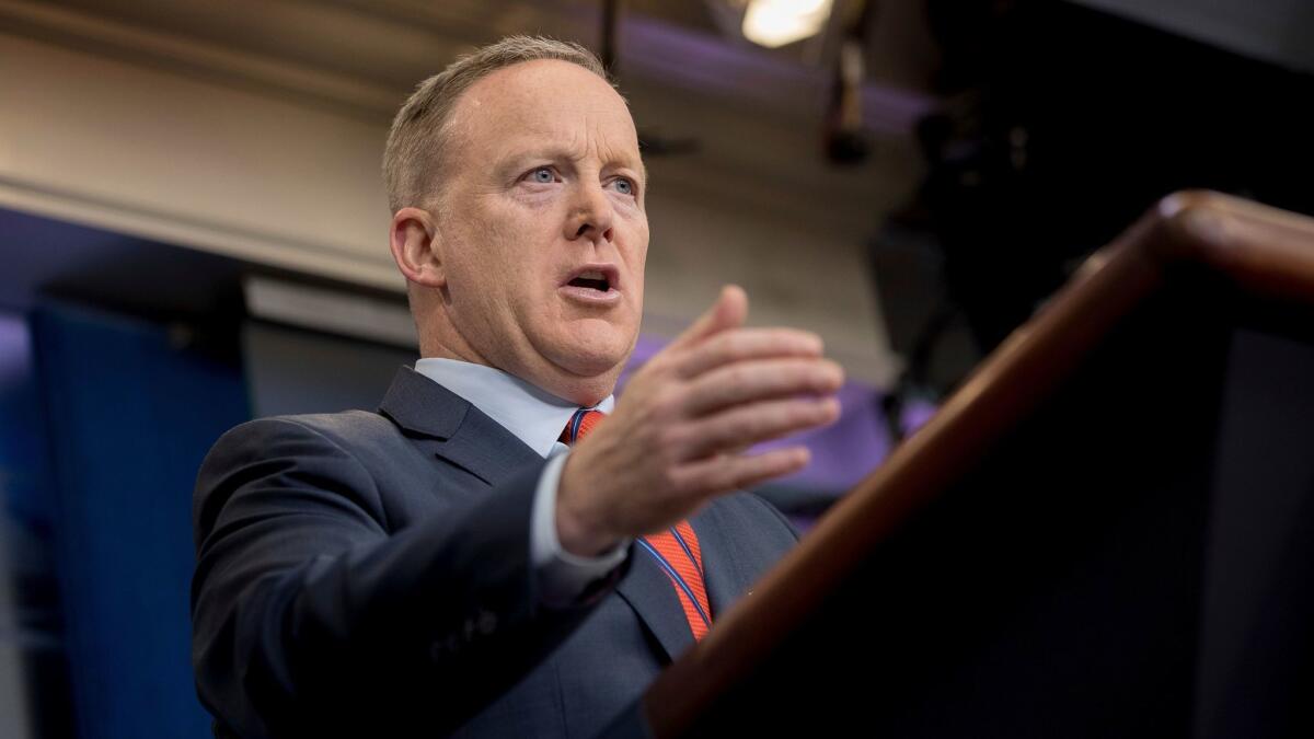 Sean Spicer talks to the media during the daily press briefing at the White House on April 11.