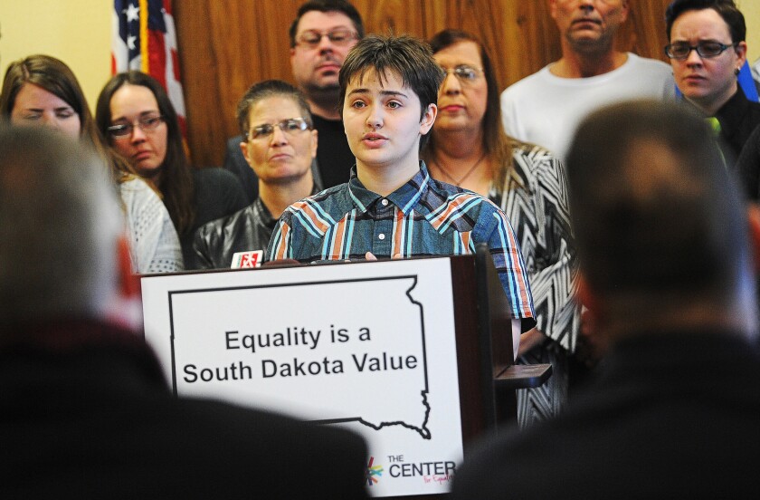 Thomas Lewis, 18, a transgender student at Lincoln High School in Sioux Falls, S.D., speaks at a news conference in January.
