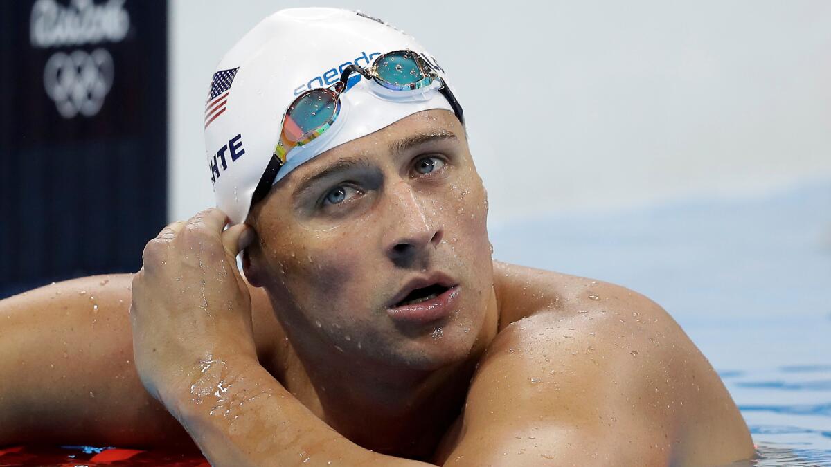 Ryan Lochte checks his time in a men's 4-by-200-meter freestyle race Aug. 9 at the Olympics in Rio de Janeiro.