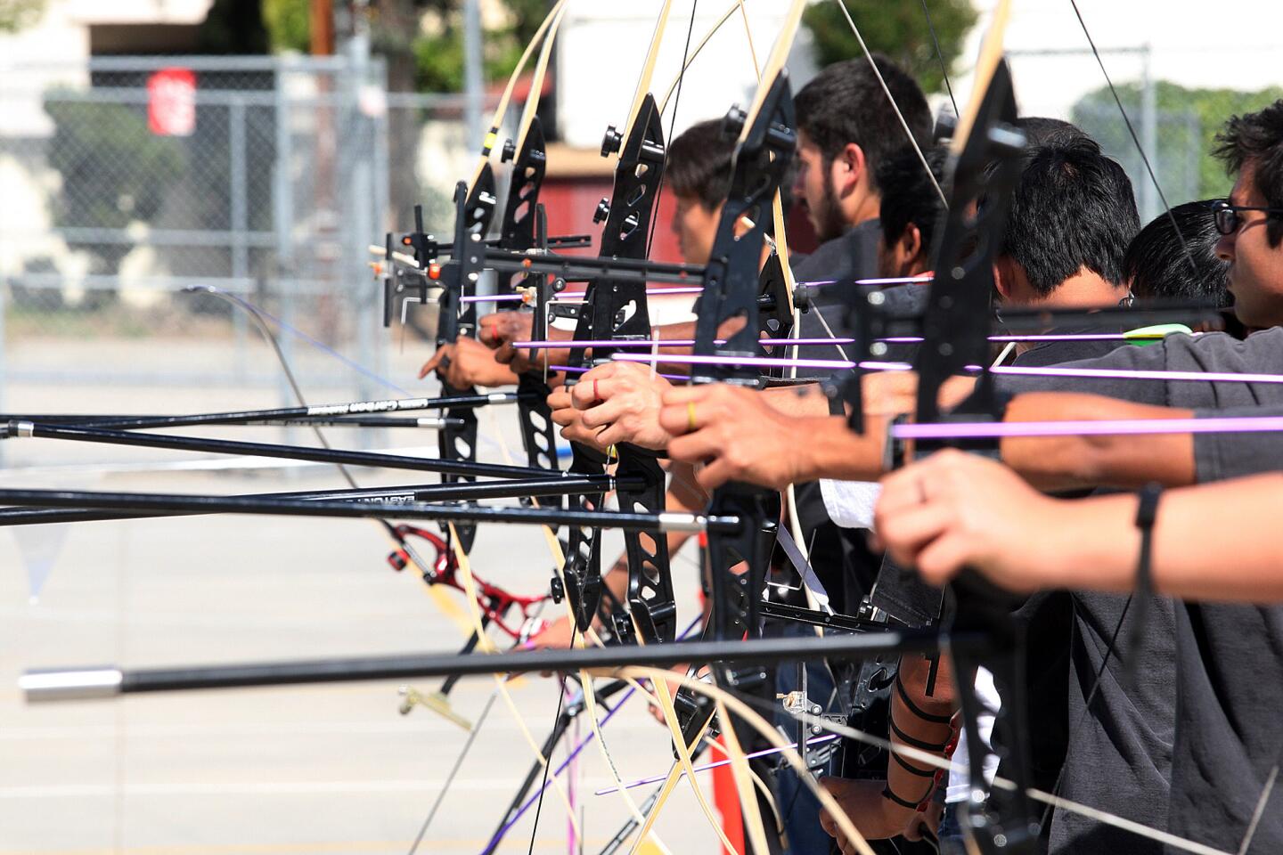 Photo Gallery: Olympic archer Khatuna Lorig visits to help Glendale High School archery team