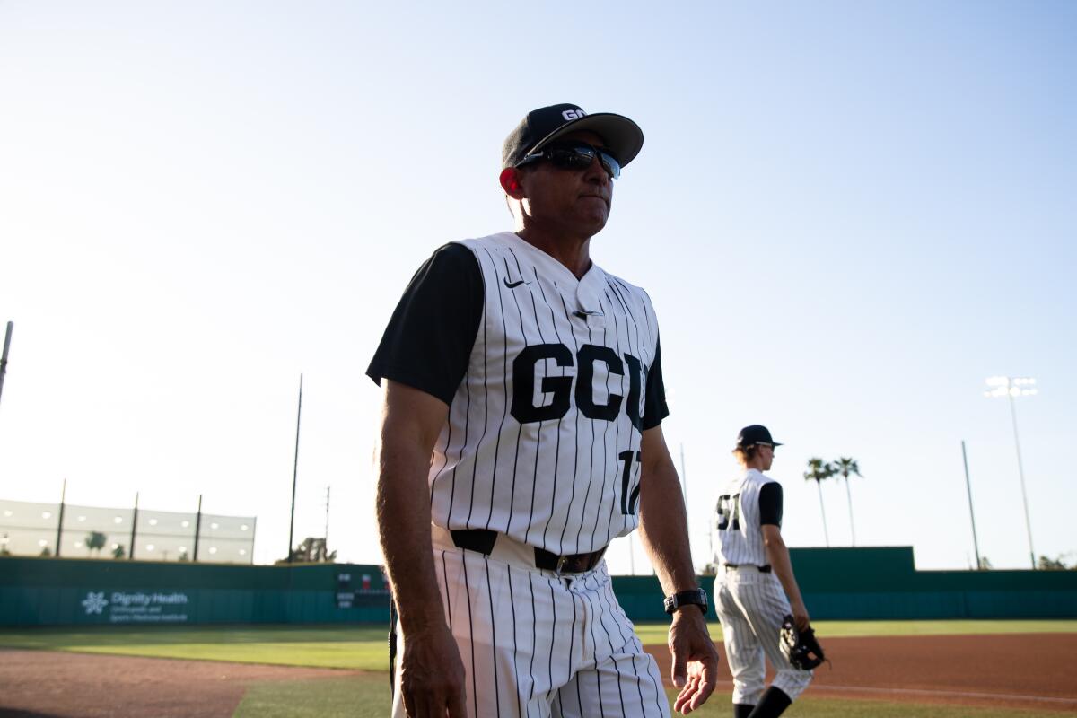 Andy Stankiewicz walks near the dugout before a Grand Canyon University game last season.