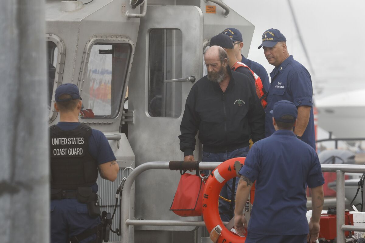 Dive boat captain Jerry Boylan is brought back to the U.S.Coast Guard station in Oxnard in Oct. 2019.