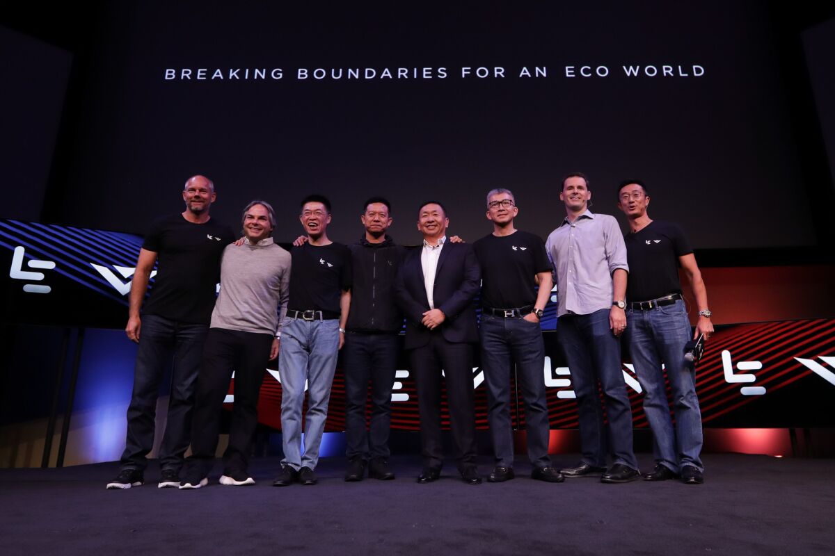 From left are: LeEco Chief Revenue Officer Danny Bowman, Dichotomy Studios founder Adam Goodman, LeVision Pictures Chief Executive Zhao Zhang, LeEco CEO Jia Yueting, Vizio Chairman William Wang, Vizio executives Ben Wong and Matthew McRae, and LeEco executive Winston Chen.