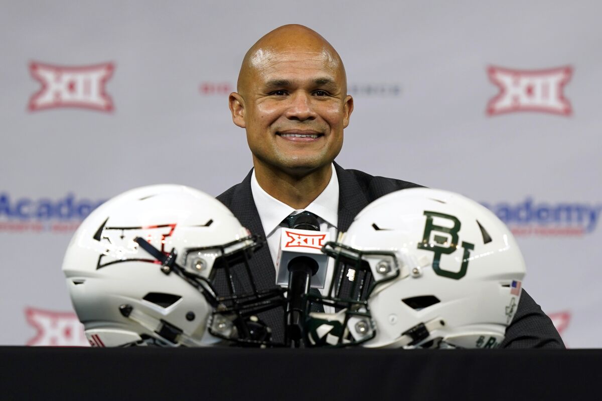 FILE - In this July 15, 2021, file photo, Baylor head coach Dave Aranda smiles as he listens to a question during an NCAA college football news conference at the Big 12 media days in Arlington, Texas. Aranda is going into his second season as Baylor’s head coach, and his first non-conference game. The Bears open their season Saturday night at Texas State. (AP Photo/LM Otero, File)
