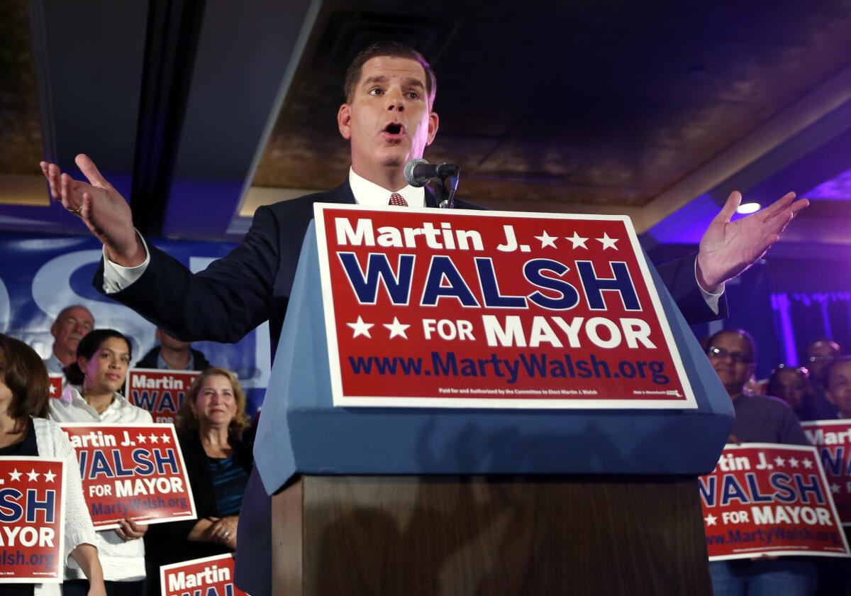 Boston Mayoral hopeful Martin Walsh speaks to supporters at his primary election night party in Boston.