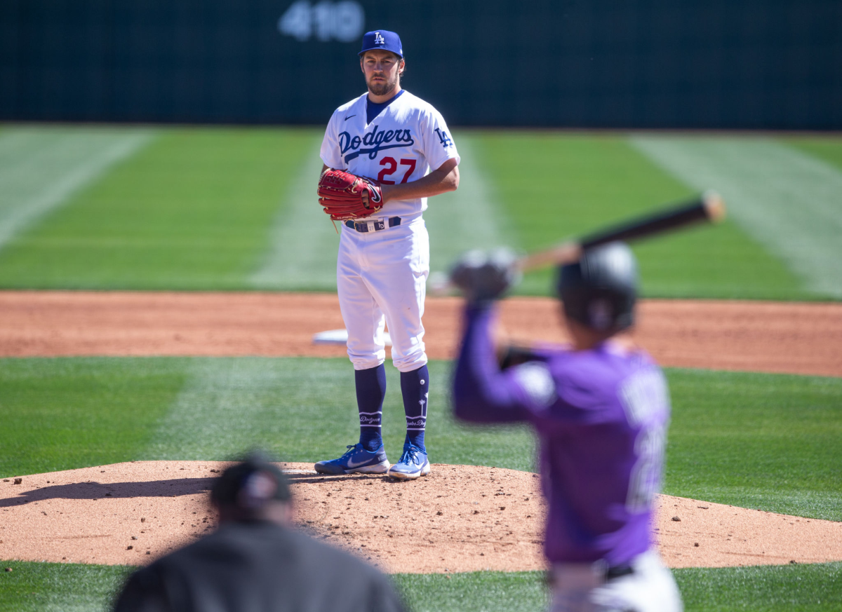 Trevor Bauer pitches for the Dodgers against the Colorado Rockies in a spring training game last year.