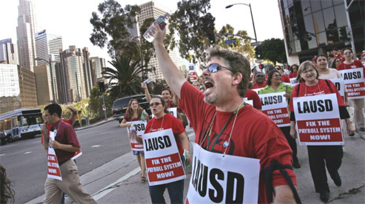 PROTEST: In September, teachers demonstrated in front of district headquarters.