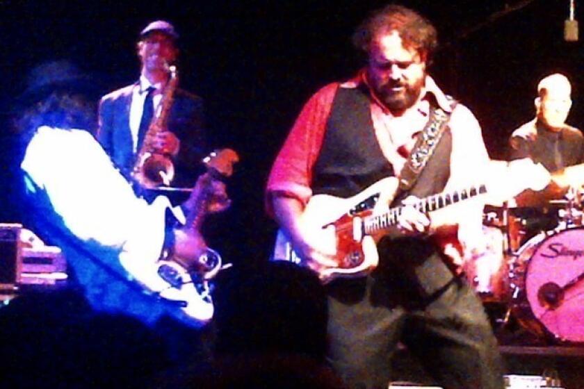 The Mavericks, with guitarist and lead singer Raul Malo in the foreground, played for nearly 2 1/2 hours on March 26 at the El Rey Theatre in Los Angeles.