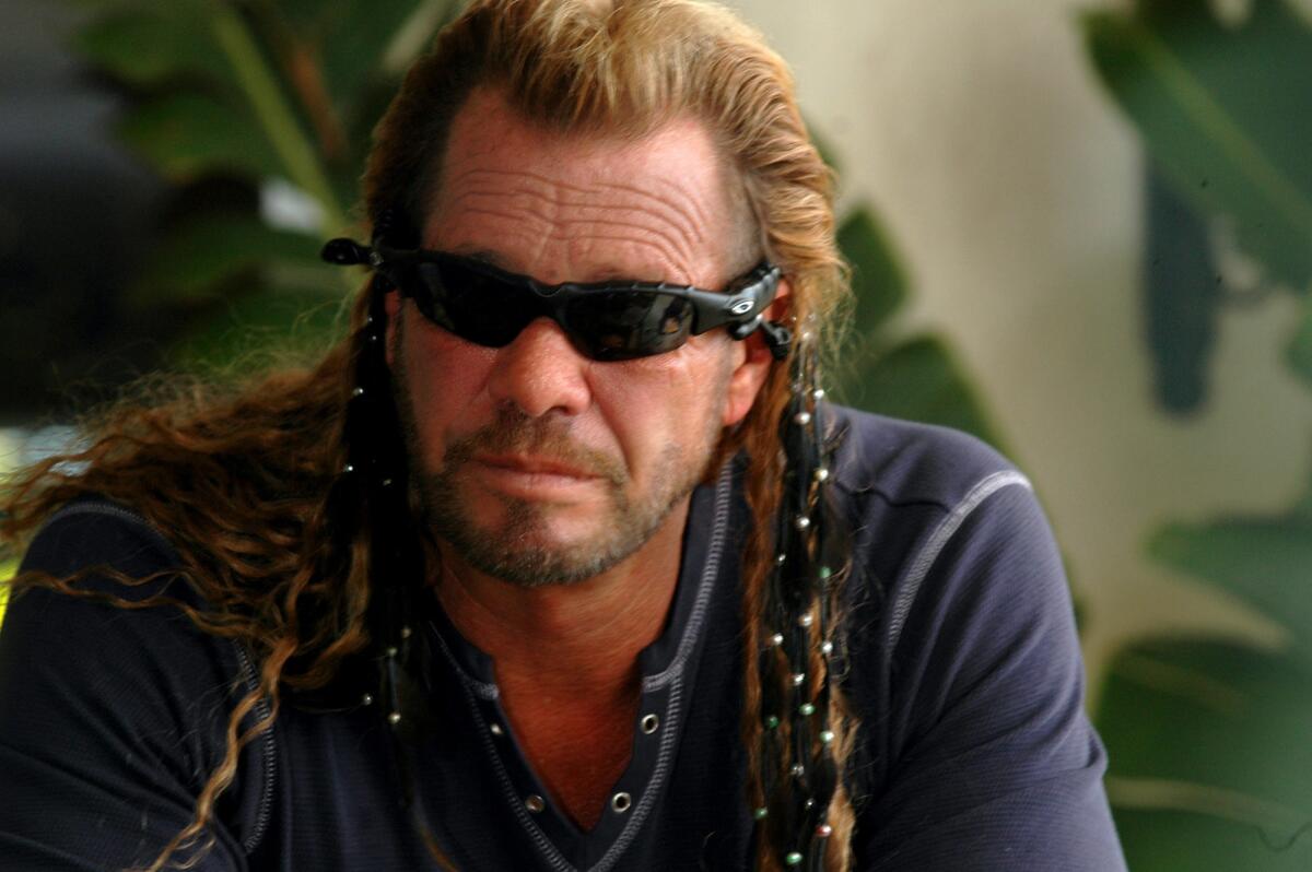 Duane "Dog" Chapman has vowed to track down the fugitive MMA star War Machine.