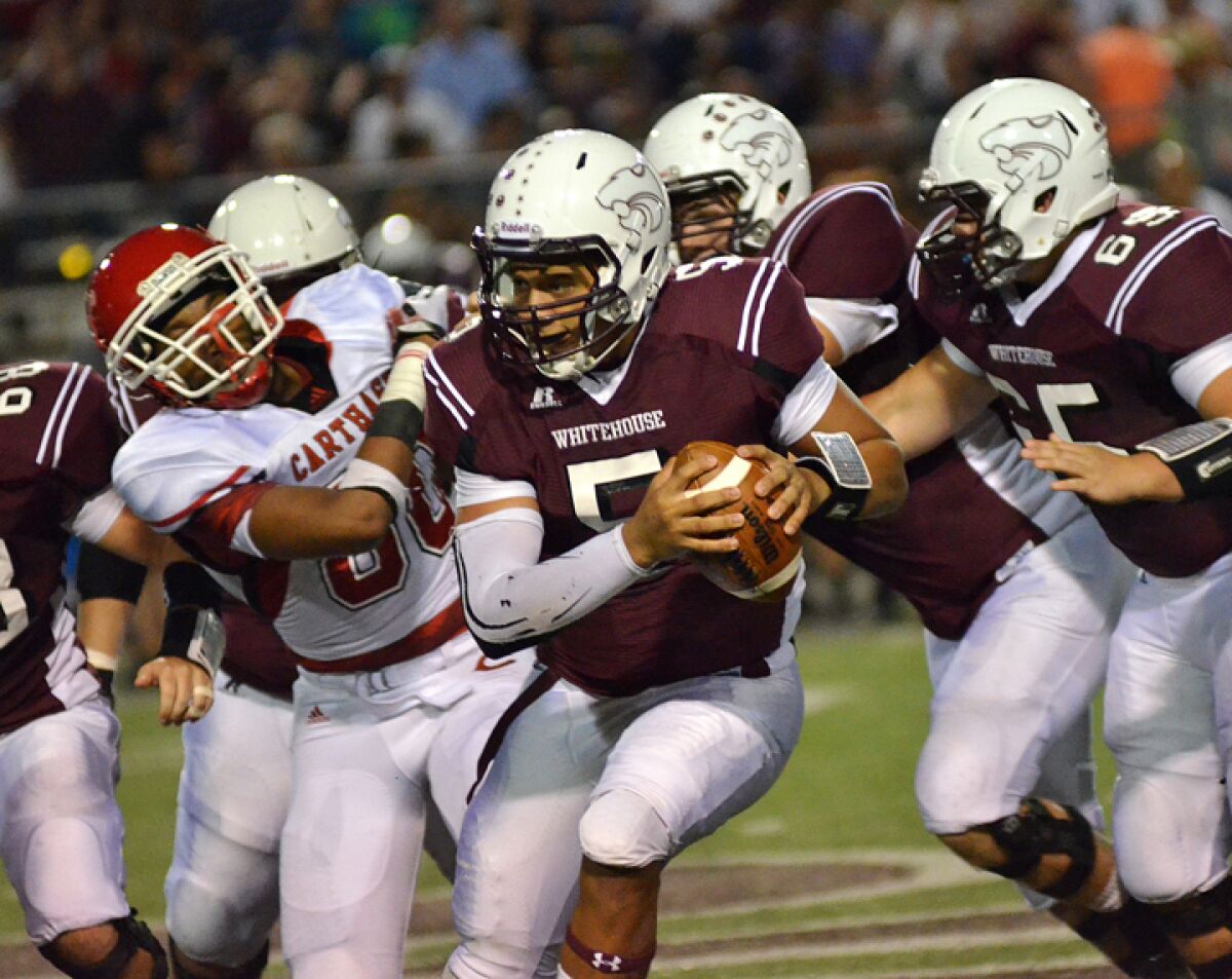 Patrick Mahomes scrambles during a 2013 game for Whitehouse High in Texas.
