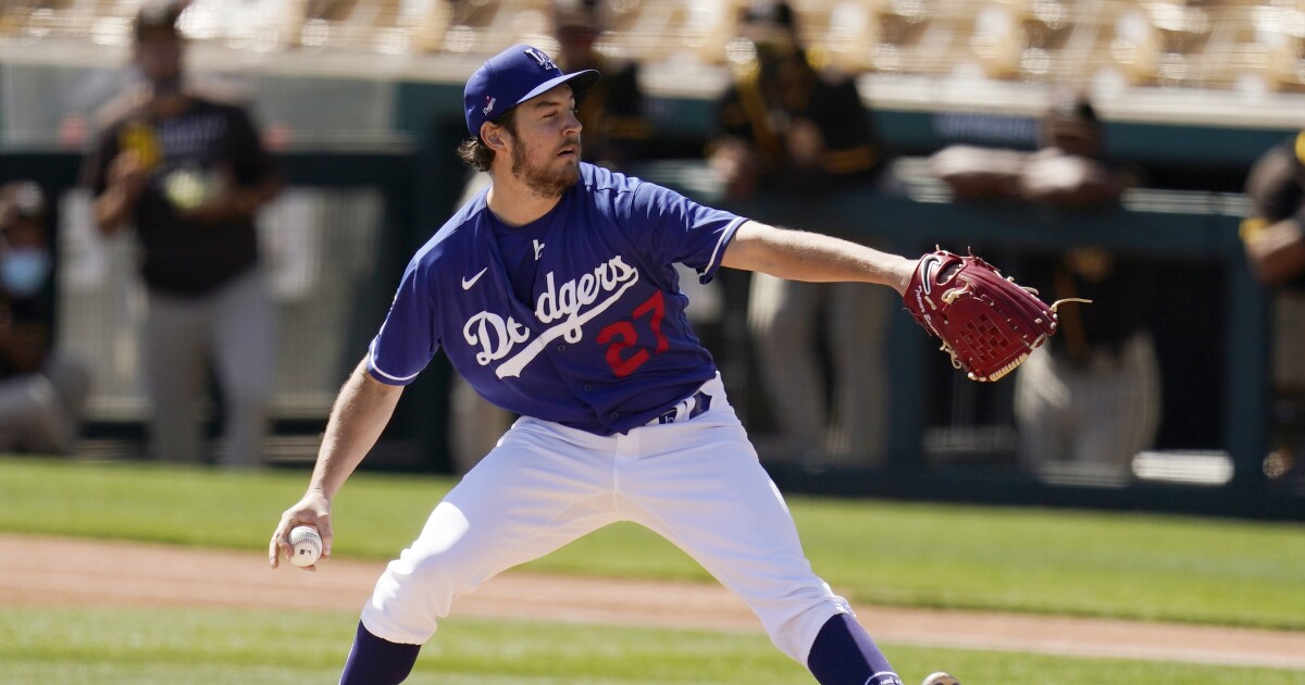 Dodgers’ Trevor Bauer plays with his eyes closed in the loss of spring