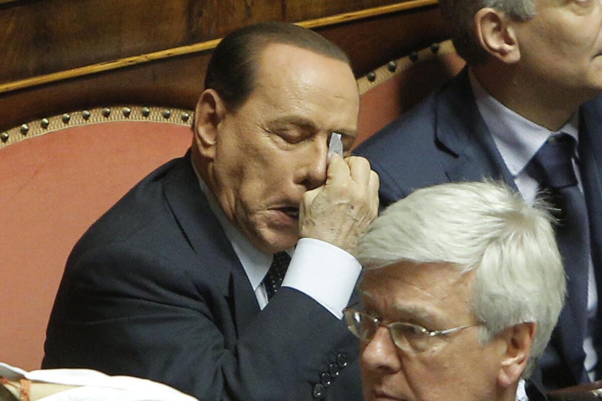 Former Italian Prime Minister Silvio Berlusconi seen here in the Italian Senate during a no-confidence vote on one of his allies July 19.