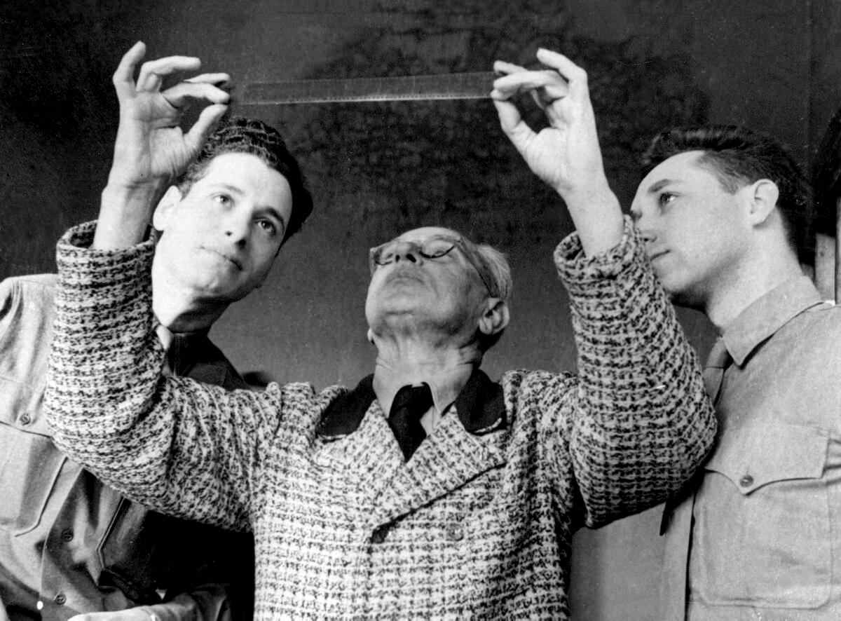 Hitler's photographer, Heinrich Hoffmann, center, and Stuart Schulberg, right, in "Filmmakers for the Prosecution."