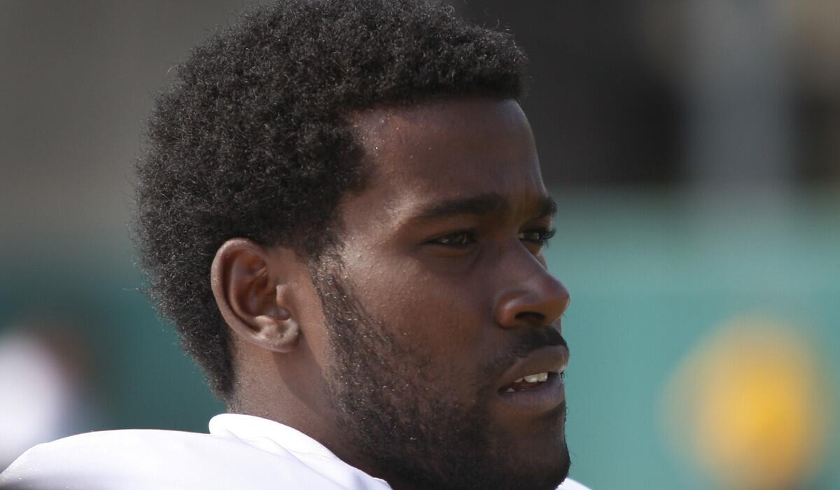 USC linebacker Lamar Dawson watches from the sidelines during practice on Aug. 17, 2012.