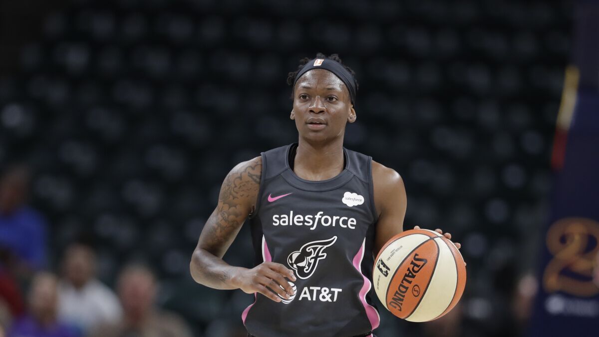 Erica Wheeler dribbles during a game.