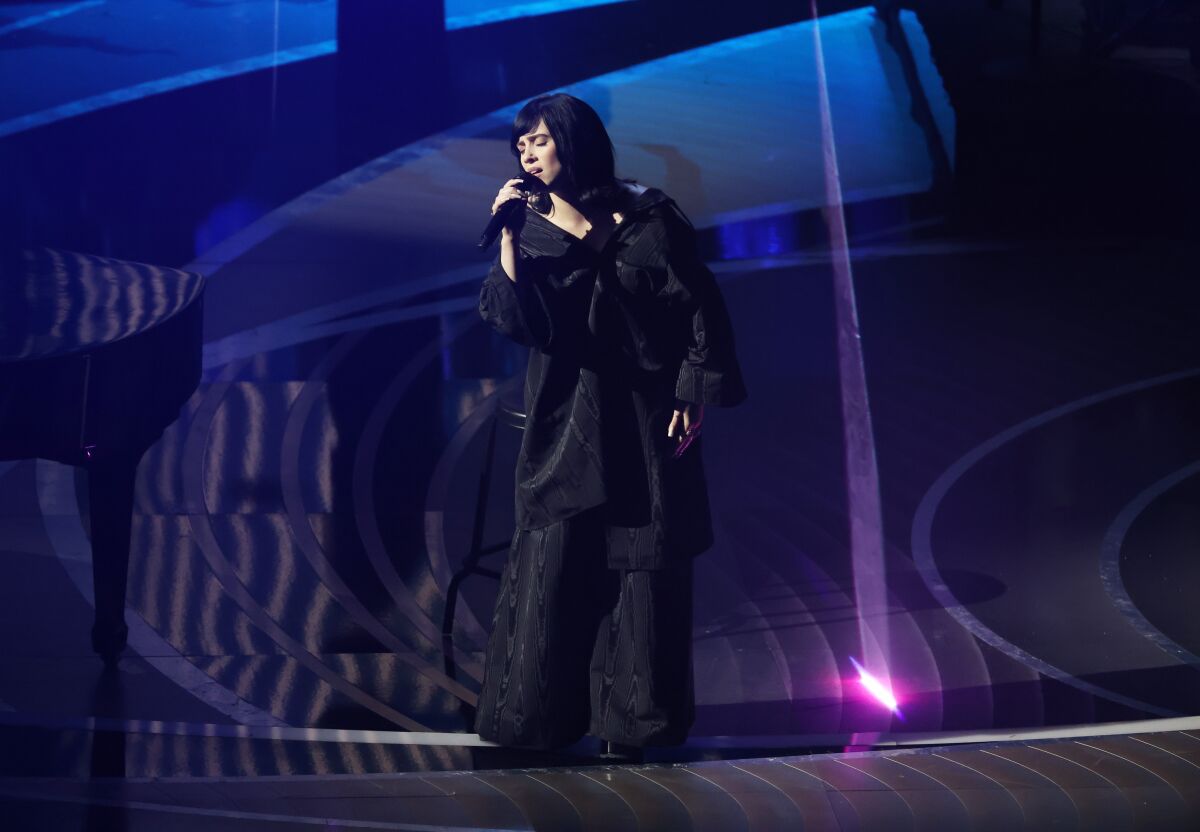 Billie Eilish and Finneas perform at the 94th Academy Awards.