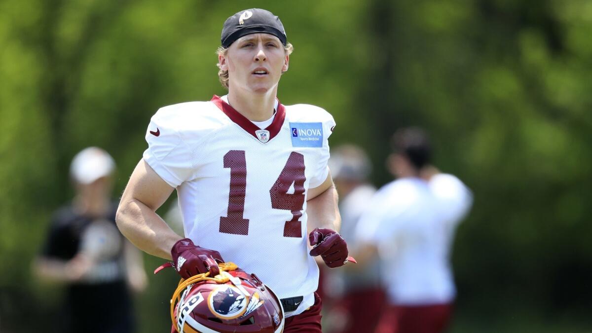 Washington Redskins wide receiver Trey Quinn, the final pick of the NFL Draft, runs across the field during the team's rookie minicamp at the Redskins Park in Ashburn, Va., on May 11, 2018.