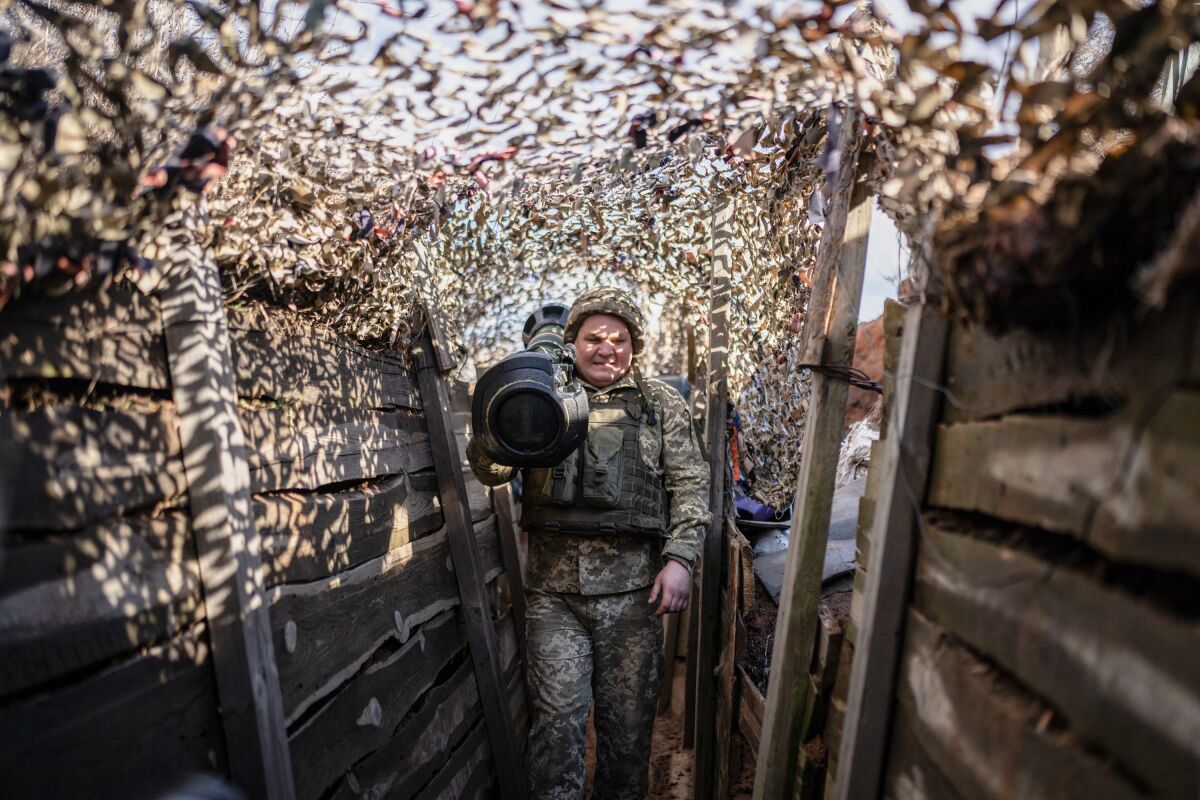 Ukrainian servicemen are seen outside of Svitlodarsk, Ukraine