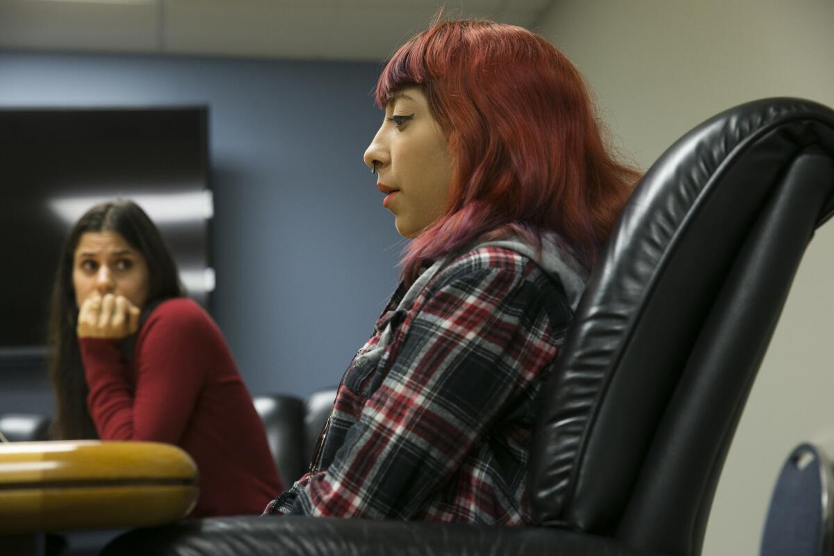 Compton Unified student Kimberly Cervantes is part of a class action lawsuit seeking academic and counseling services from the Compton Unified School District. Attorney Annie Hudson-Price looks on.