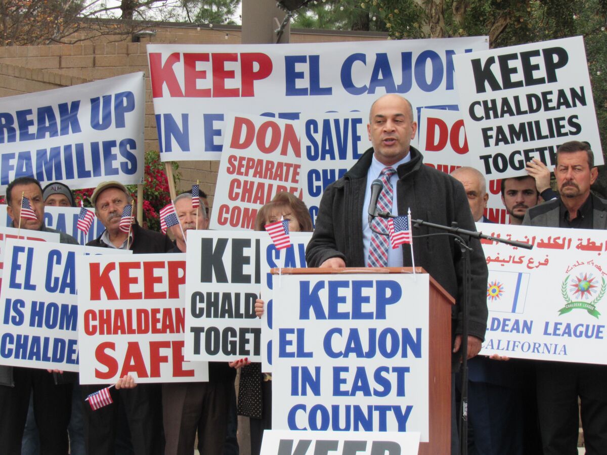 Mohammed Tuama, a Middle Eastern community leader, speaks at a rally last year in El Cajon.