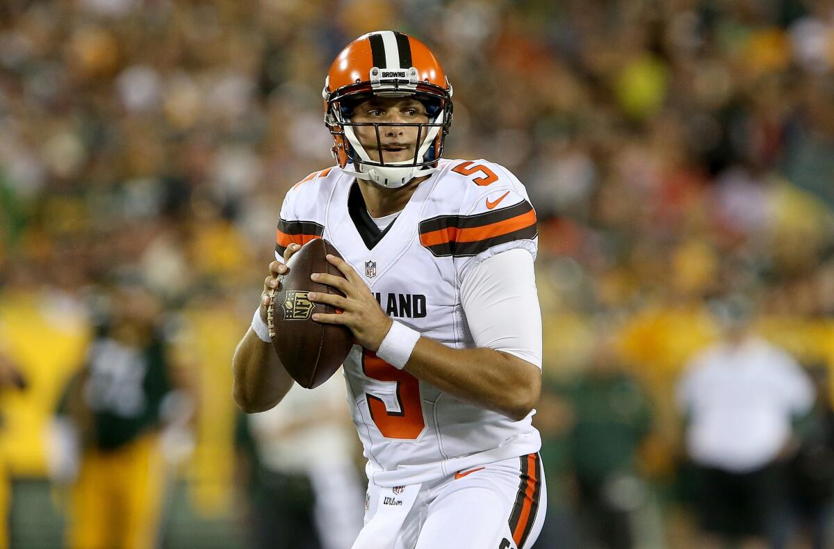 Browns quarterback Cody Kessler (5) drops back to pass in a preseason game against the Green Bay Packers on Aug. 12.