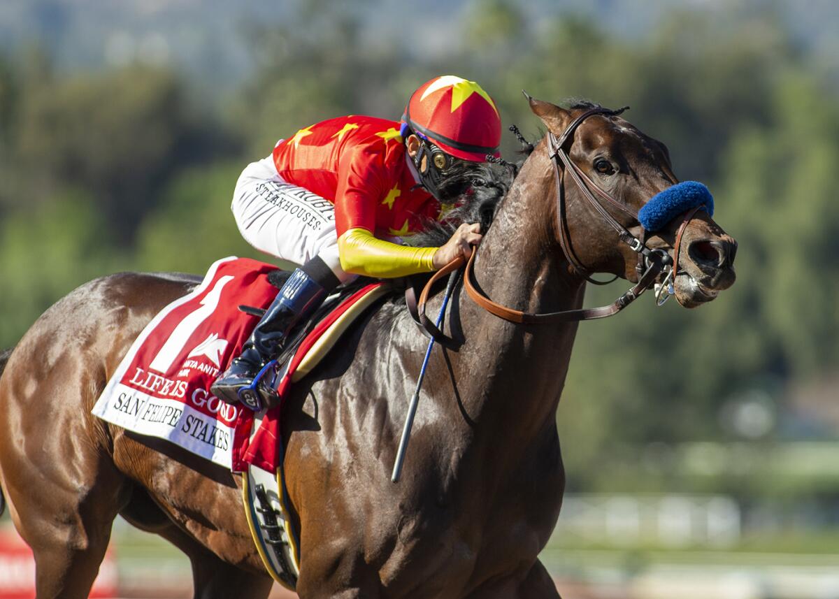 Life Is Good and jockey Mike Smith win the $300,000 San Felipe Stakes on March 6 at Santa Anita Park.