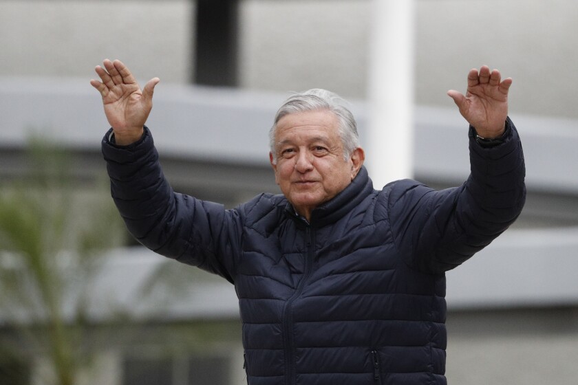 Mexican President Andrés Manuel López Obrador waves to supporters April 3 in the Coyoacán district of Mexico City.