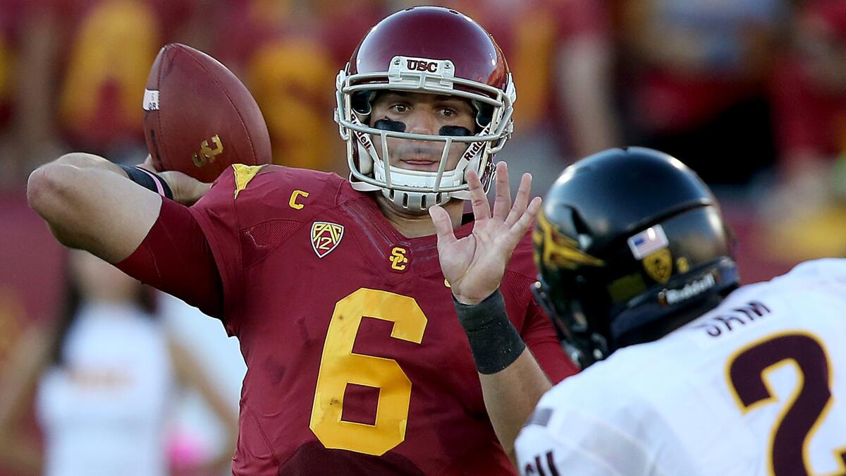 USC quarterback Cody Kessler passes during a game against Arizona State at the Coliseum on Oct. 4, 2014.