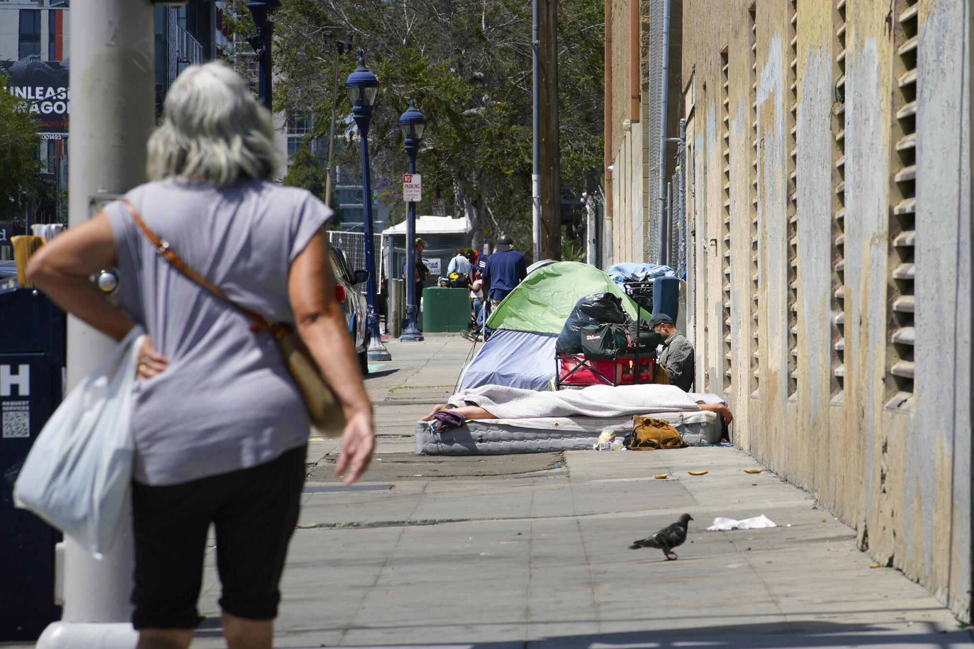 Several individual sleeping spots on 16th Street in San Diego.