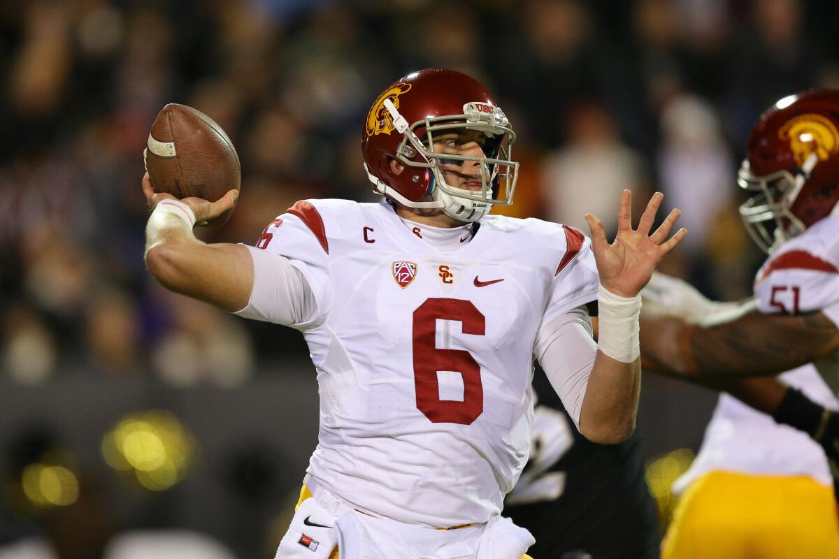 Trojans quarterback Cody Kessler unleashes a pass against the Buffaloes in the first half on Nov. 13.