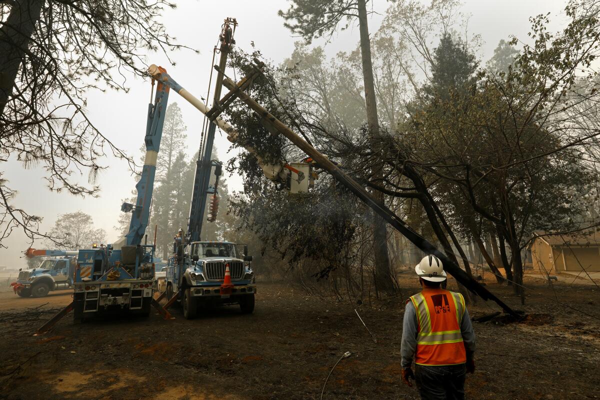 A PG&E worker in the aftermath of the Camp fire.