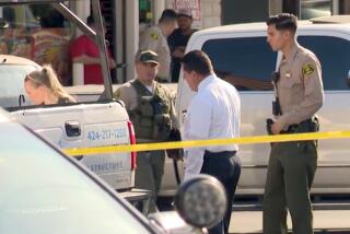 West Los Angeles, CA-Aug. 7, 2024-Los Angeles Sheriff's Department personnel on the scene of a deadly fight in West Hollywood on Aug. 6, 2024. Detectives with the Los Angeles County Sheriff's Department are investigating after what appears to be a road-rage fueled physical altercation following a collision in a West Hollywood parking lot that left a man dead. The incident, according to an LASD news release, occurred in the 7900 block of Santa Monica Boulevard, at Hayworth Avenue and was reported at around 1 p.m. (KTLA)